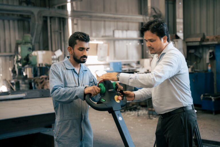 ADW Machinery showing a factory operator the MOVEXX TT2500-S-AT tiller controls